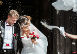 Bride and groom going out of church