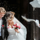 Bride and groom going out of church